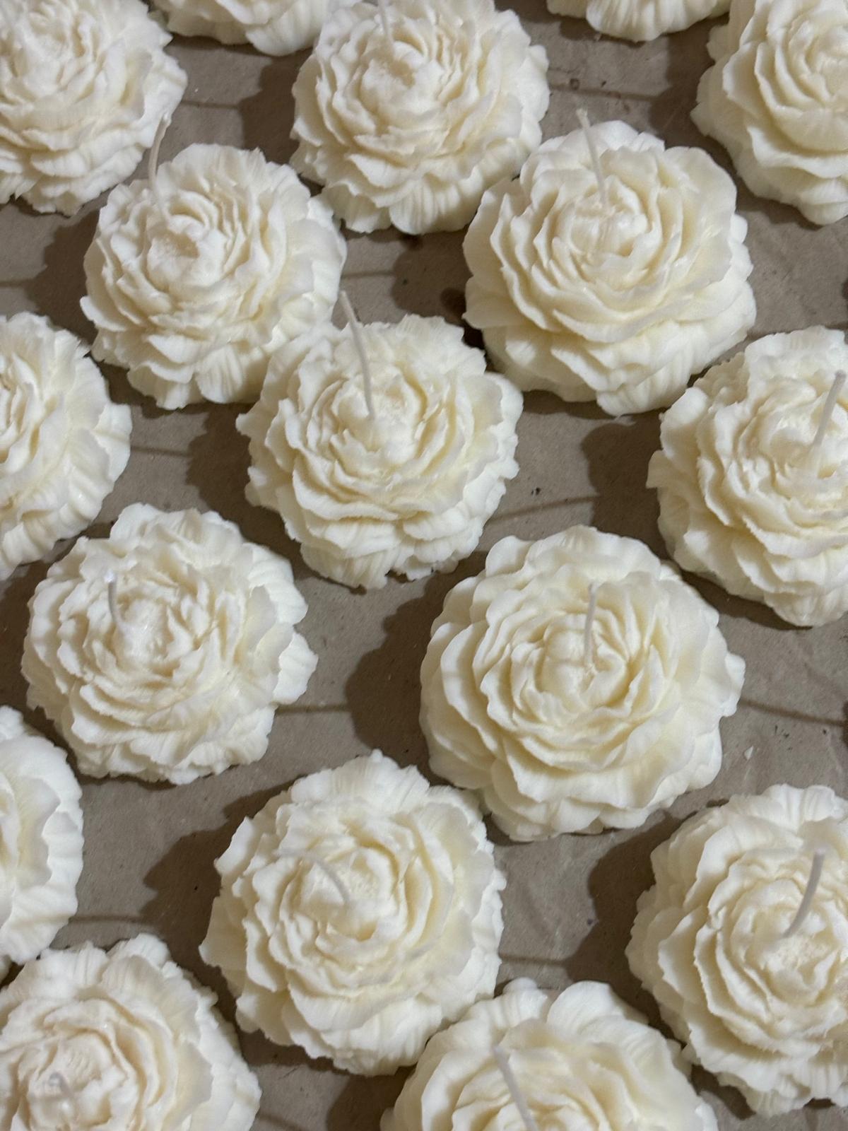 Peonie di cera. Belle da morire (letteralmente, poi le accendi)